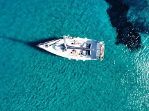 Sailing from Milos to Mykonos, exploring the Aegean with a skipper and onboard cooking